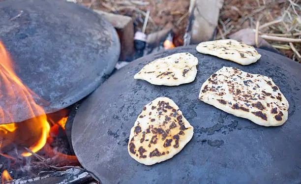 Pita bread baking on a Saj or Tava on Lag Baomer