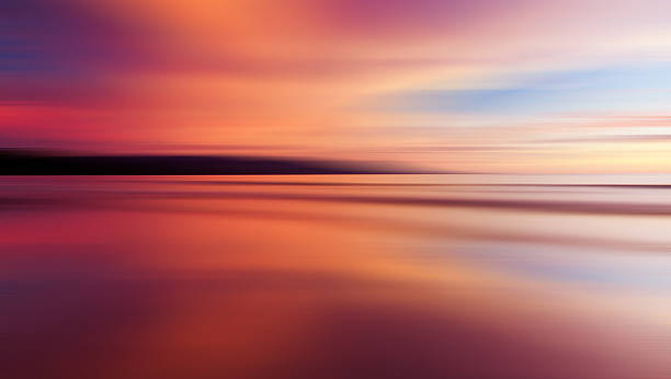kolorowy zachód słońca z długich ekspozycji działanie, ruch niewyraźne - multiple exposure long sea water zdjęcia i obrazy z banku zdjęć