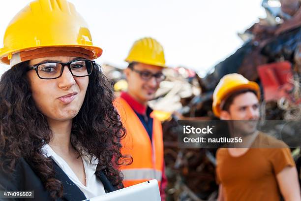 Portrait Of Young Famale Architect At Work On Site Stock Photo - Download Image Now - 2015, Adult, Adults Only