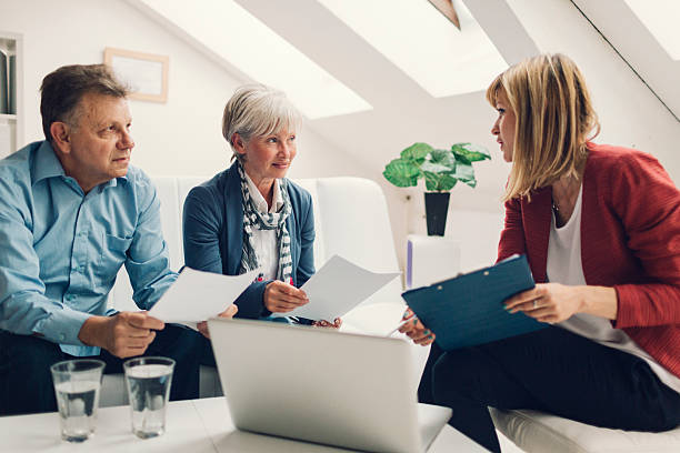 istock Mature Couple Meeting with Financial Advisor. 474096640