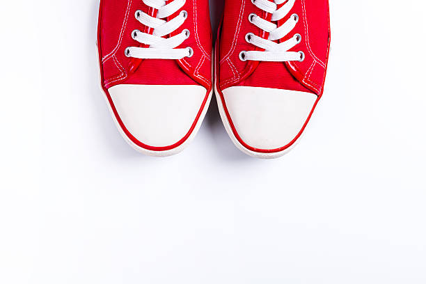 istock Closeup of red sneakers on white background 474102484