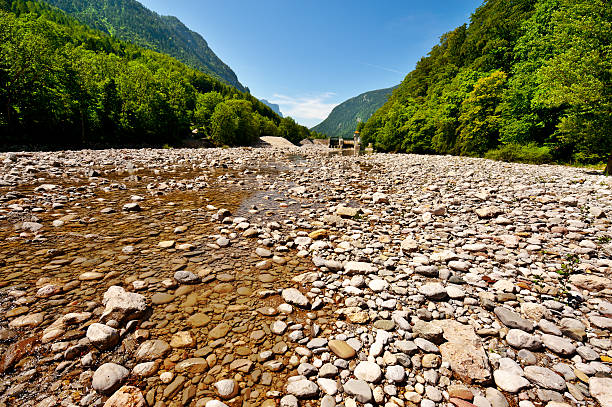 River Bed Dry River Bed in the Bavarian Alps, Germany riverbed stock pictures, royalty-free photos & images