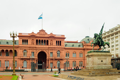 Buenos Aires, Argentina - September 17, 2009: Scene of May square and the Pink House (La Casa Rosada, the presidential house), with local and tourists, in Buenos Aires, Argentina