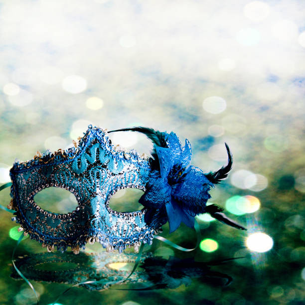 Female carnival mask with shiny background.