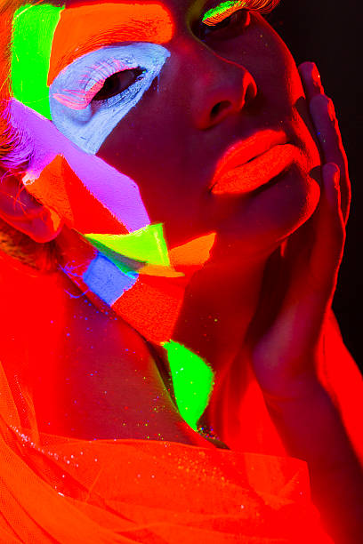 istock Women Portrait in Ultraviolet Light 474109399