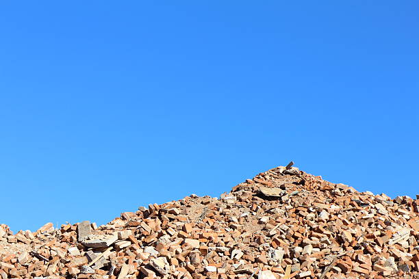 istock rubble mountain in front of blue sky 474118863