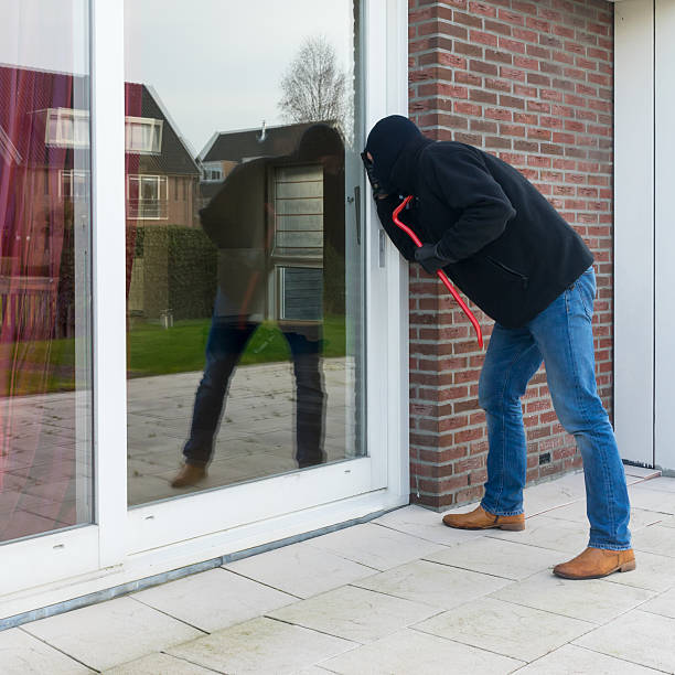 istock Burglar with a crowbar 474120453