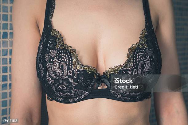 Detail Of A Girl Posing In The City Streets Stock Photo - Download Image Now - Bra, Breastfeeding, Close-up