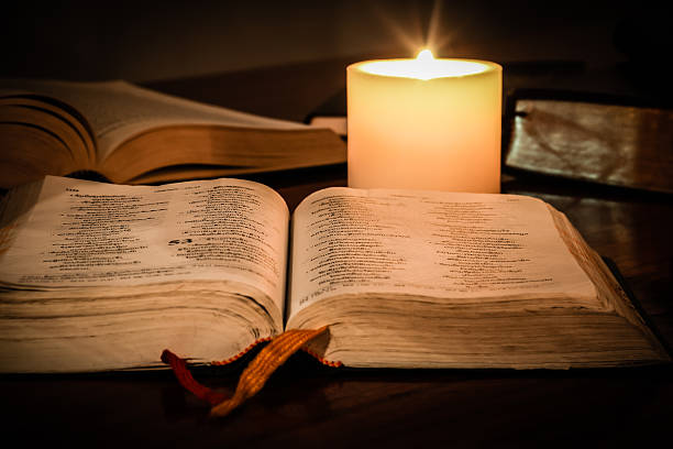 istock Lao Bible by Candlelight 474122041