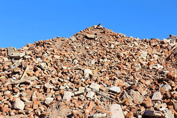 istock rubble mountain in front of blue sky 474125013