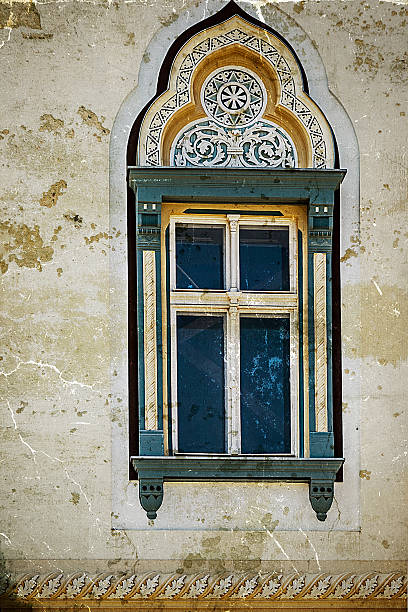 istock Old window from Timisoara, Romania, in vintage look 474125796