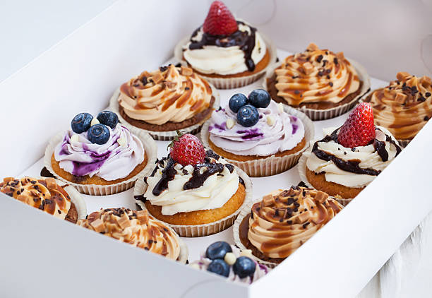 istock Set of different  cupcakes in a  box 474125884