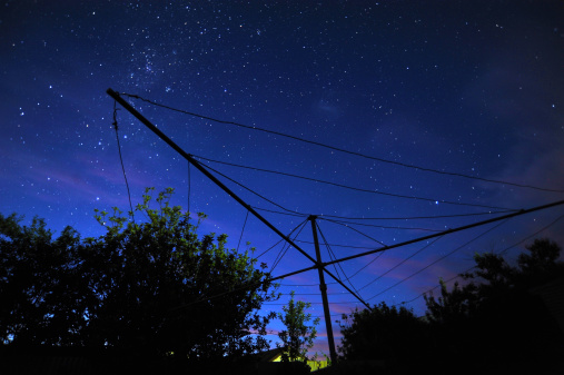 Clothes line on starry night.