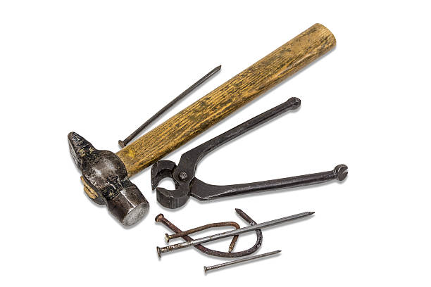 istock Old hammer, pincers and nails 474126912