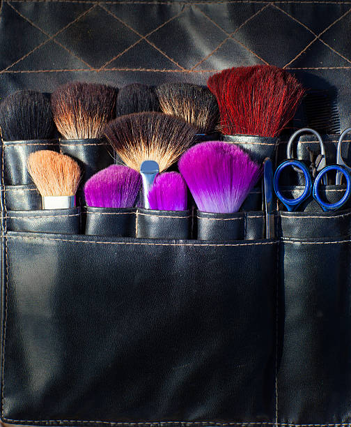 istock brushes scissors and tools of makeup artist in black 474127328