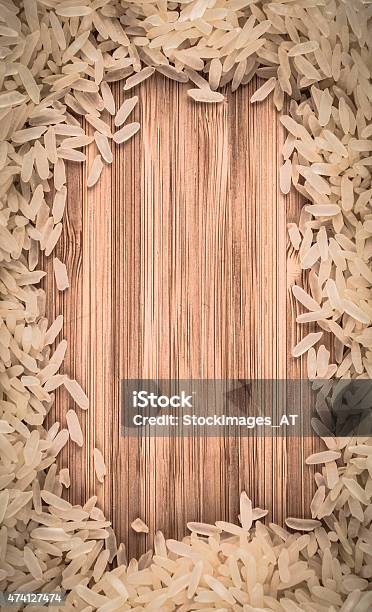 Rice Frame On Wooden Table Stock Photo - Download Image Now - 2015, Basmati Rice, Black Color