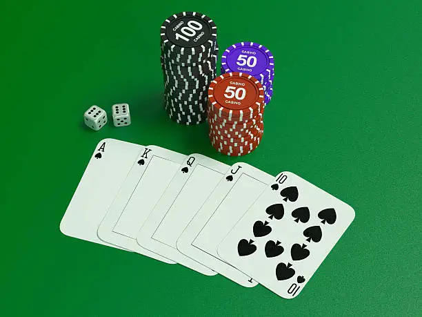 Cards and chips for poker on green table.  High resolution.