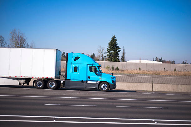 istock Nice profile semi truck blue trailer multy-lines road 474127932