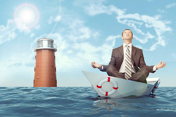 istock Businessman sitting in lotus position 474128004