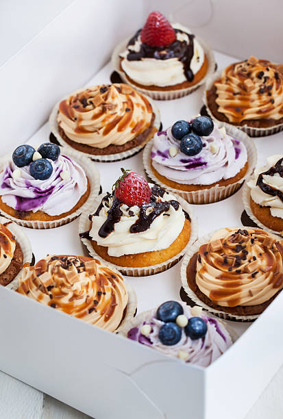 istock Set of different  cupcakes in a  box 474128506