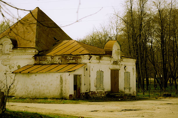 Beautiful old abandoned building farm house in countryside on natural background