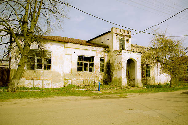 istock Destroyed building power plants with broken windows in the Russi 474131912