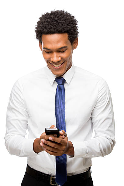 istock Cheerful young business man texting 474137147