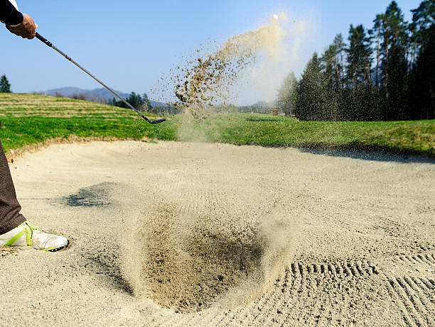 istock The golf course is on the sand. Sand making splashes 474137732