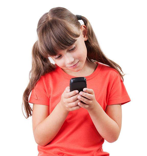 istock Little girl with a mobile phone 474137782