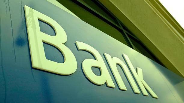 istock Bank signed from down and the building detail 474138014