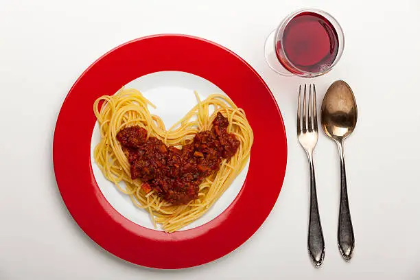 heart shaped spaghetti on a plate