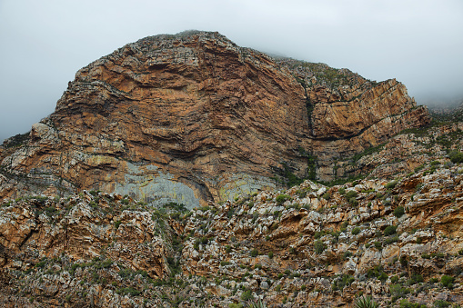 Majestic rocky redish mountains in Seweweekspoort pass, South Africa