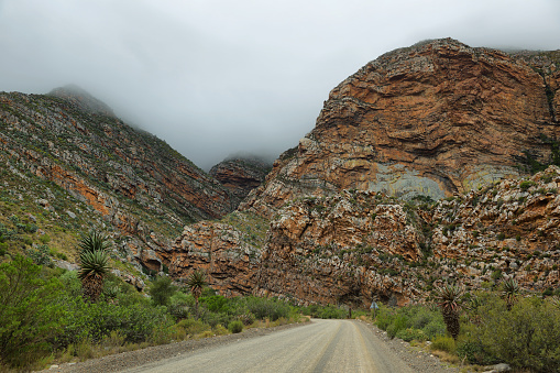 Majestic rocky redish mountains in Seweweekspoort pass, South Africa