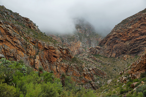 Majestic rocky redish mountains in Seweweekspoort pass, South Africa