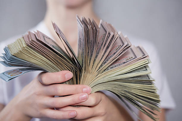 istock Money in female hands 474139390