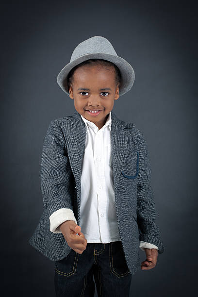 istock Handsome boy doing different expressions in different sets of clothes 474140142