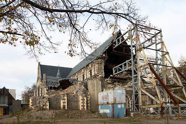 Rebuilding of Christchurch Cathedral Christchurch, New Zealand - May 2, 2015: Christchurch Cathedral was demolished by the earthquake in February 2010. Now the building is on reconstructuion and it is a popular sightseeng spot for tourists. christchurch earthquake stock pictures, royalty-free photos & images