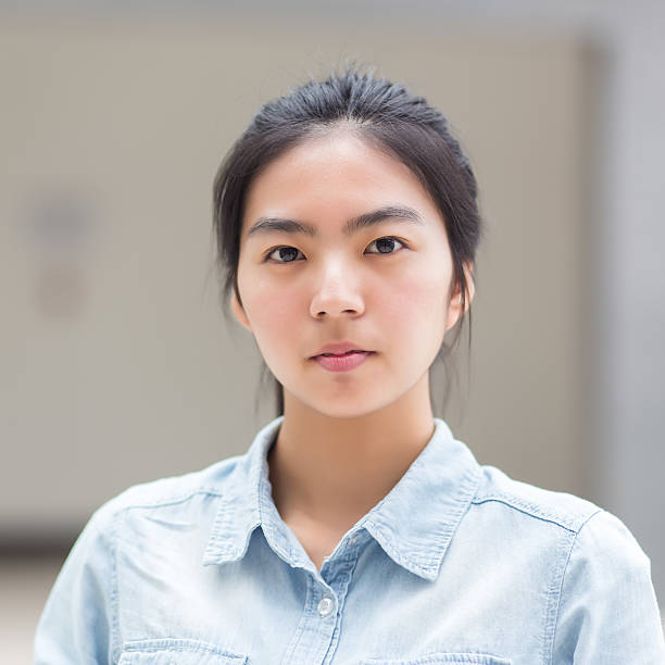 istock Young girl front view portrait photo 474144564