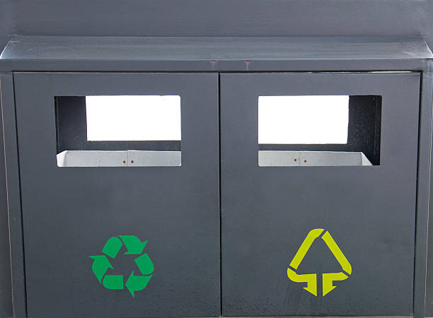 Recyclable and non-recyclable trash symbol stock photo