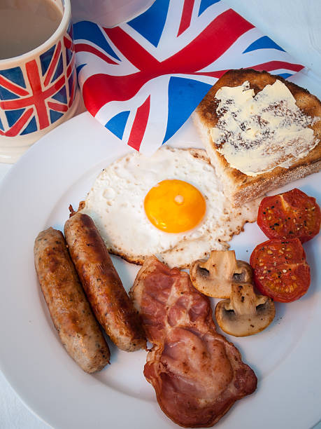 istock English breakfast with union jack mug and british flag 474145771