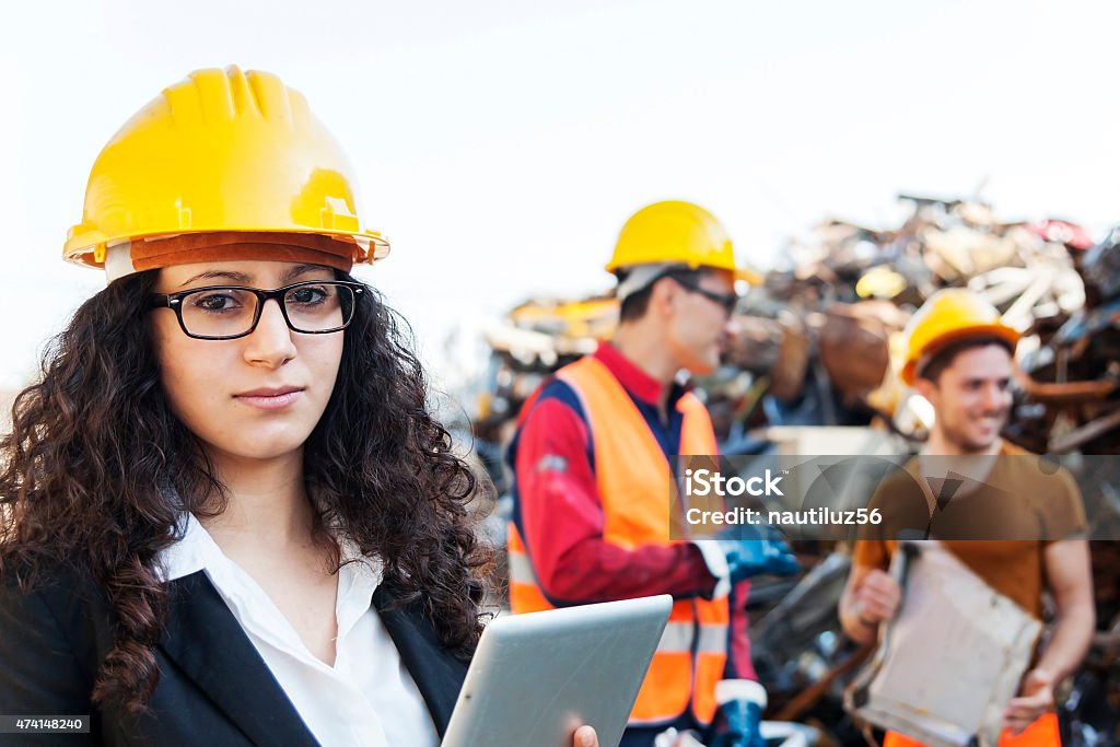 portrait of young famale architect at work on site Hardhat Stock Photo