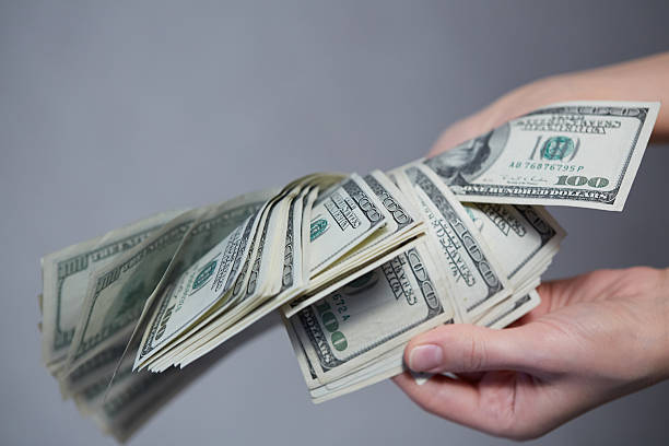 istock Money in female hands 474148258