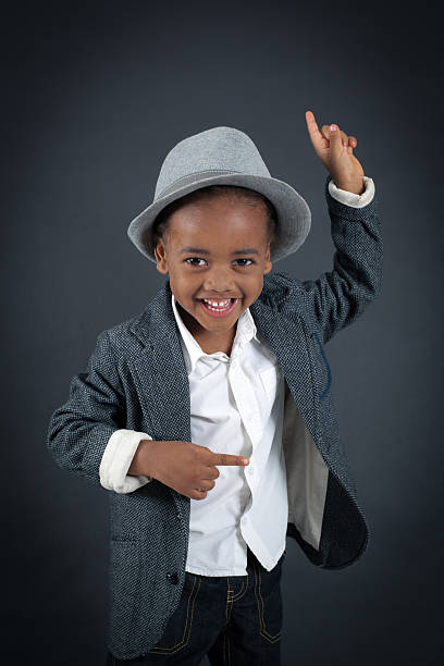 istock Handsome boy doing different expressions in different sets of clothes 474148696