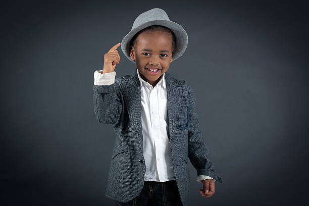 istock Handsome boy doing different expressions in different sets of clothes 474150710