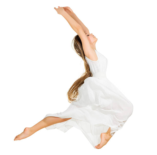 istock Young dancing girl in dress 474151098