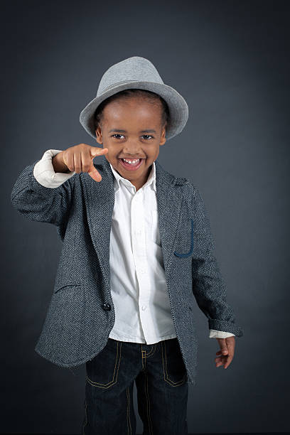istock Handsome boy doing different expressions in different sets of clothes 474151272