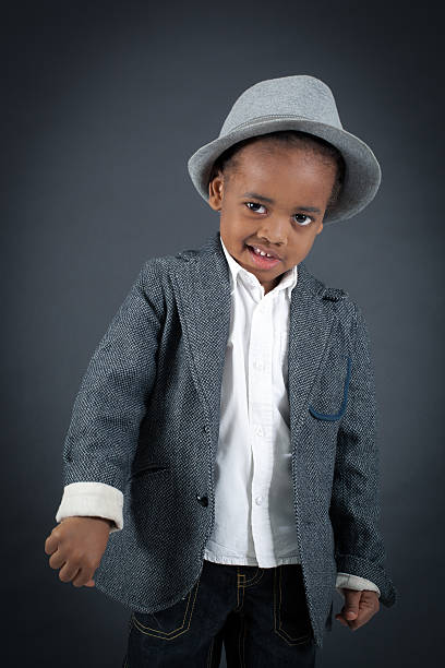 istock Handsome boy doing different expressions in different sets of clothes 474151274