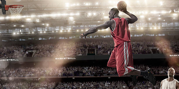 istock Basketball Mid Air Slam Dunk 474151986