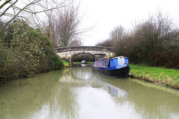 istock narrow boat on canal 474152948