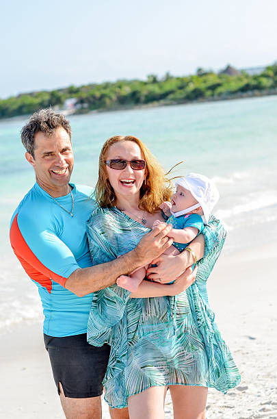 istock Father, mother and a baby 474155266